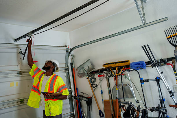 Professional Garage Door Panel Replacement technician working in Orient, NY